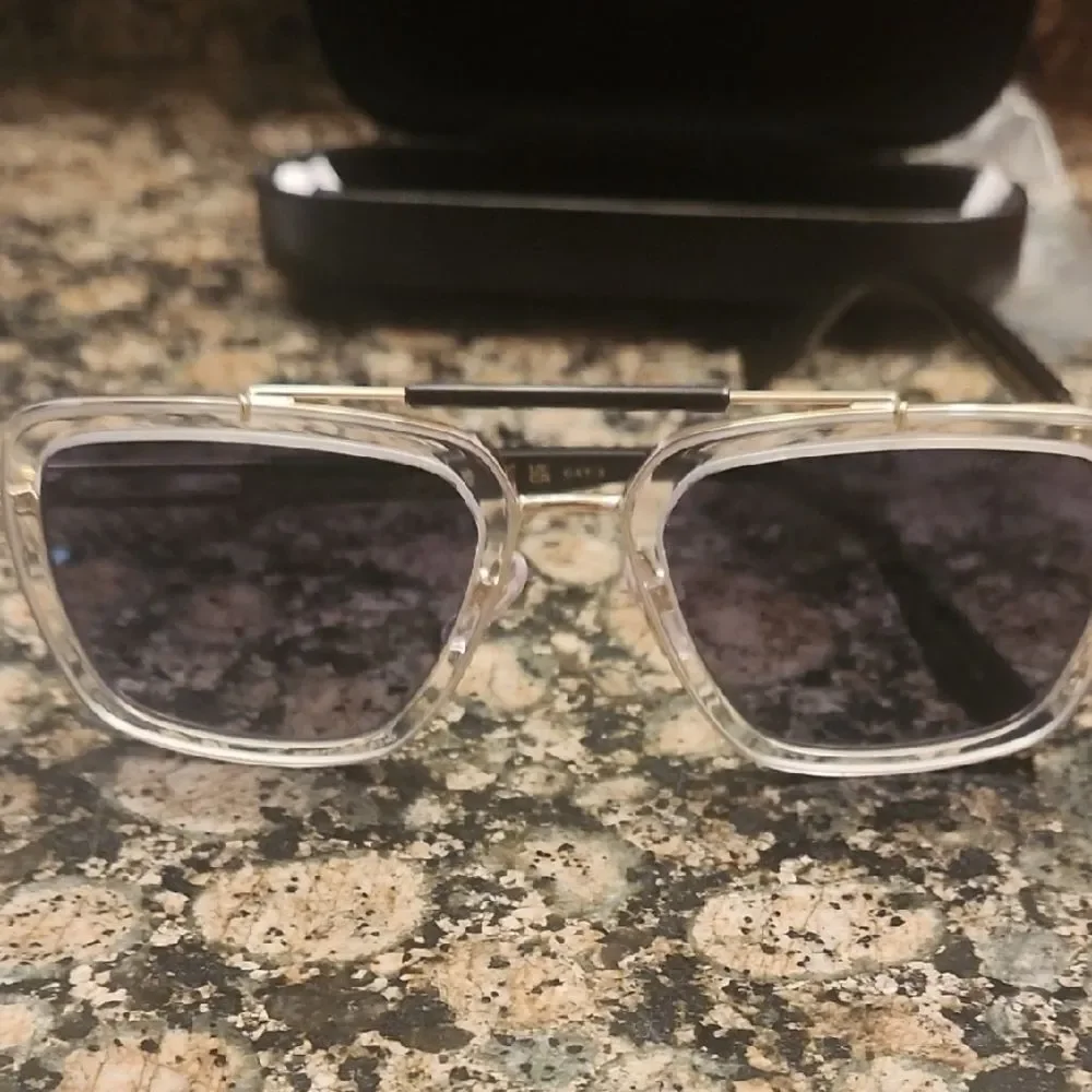 Marc Jacobs Transparent Frame Sunglasses with Dark Lenses